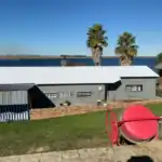 Airless spray painting of an exterior wall