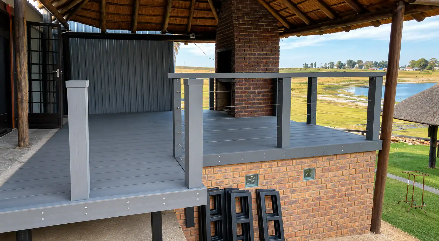 Composite decking installed on a lapa at a lakeside property in Secunda